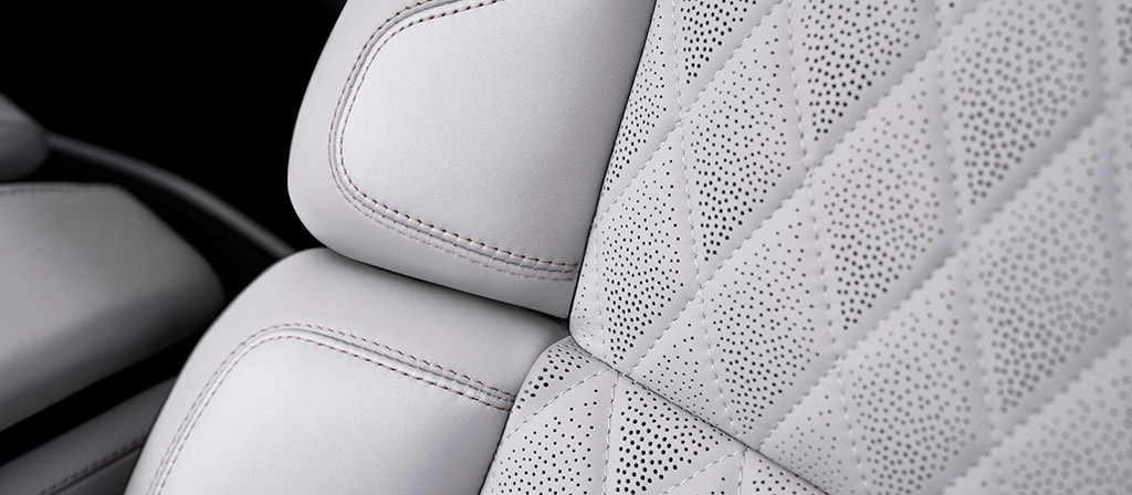 The quilted front seat of the Atmospheric theme in a 2026 Lincoln Black Label Navigator® SUV features extra padding