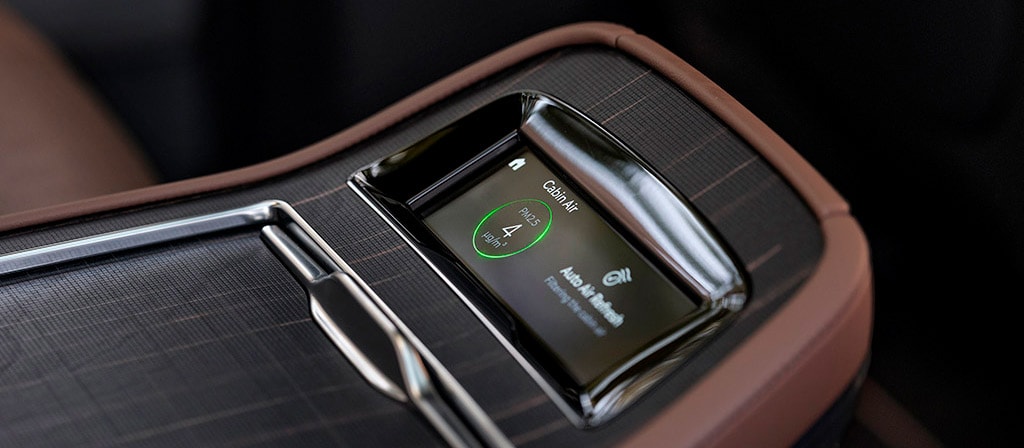 The Horizon Grid real-wood appliqué carries through to the second row controls in the 2026 Lincoln Black Label Navigator® SUV