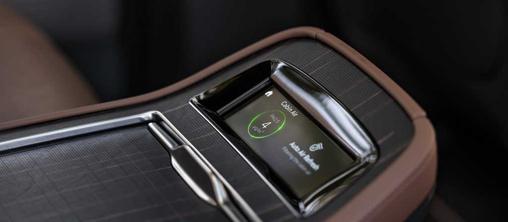 The Horizon Grid real-wood appliqué on the available second-row console controls in the 2027 Lincoln Navigator® Black Label™ model