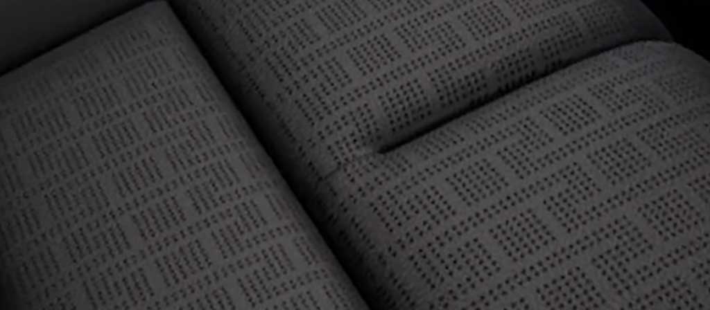 A repeating pattern in the leather seating surface of the Invitation theme represents a pergola