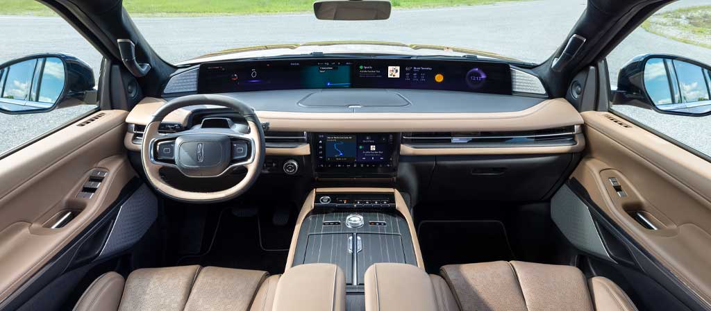 The interior of a 2027 Lincoln Navigator® Black Label™ model plays host to a dramatic panoramic display
