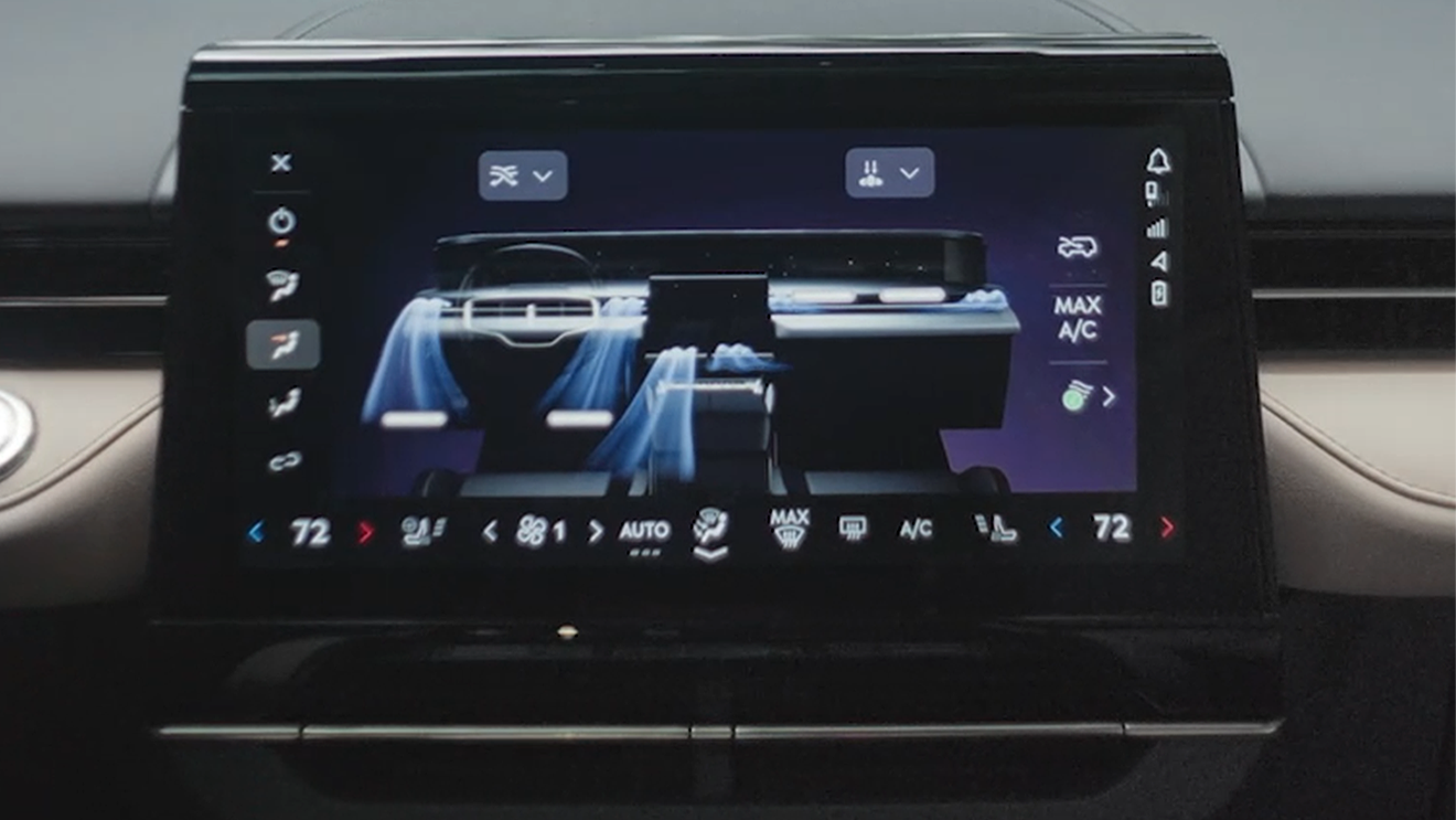Close-up of the Lincoln centre touchscreen displaying the climate control interface and settings.