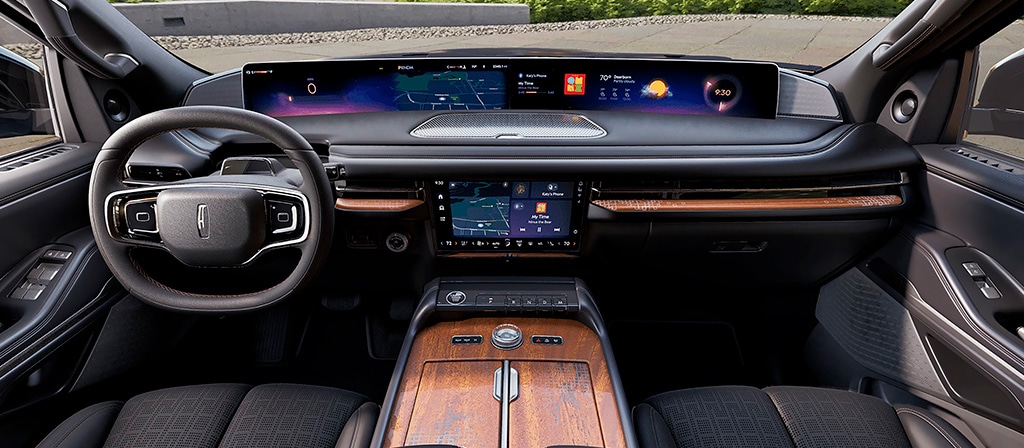 The front cabin of a 2026 Lincoln Black Label Navigator® SUV in the Invitation theme