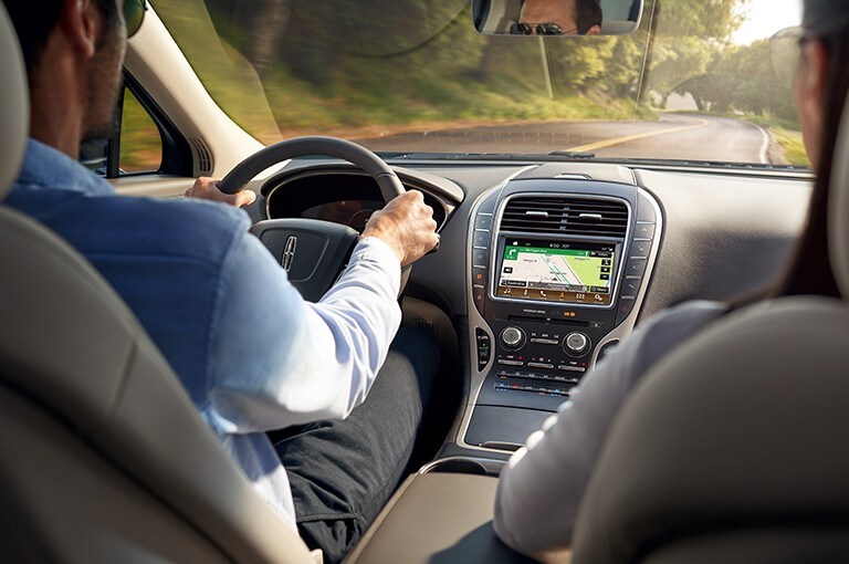 Lincoln owners are utilizing the G P S while driving on the road