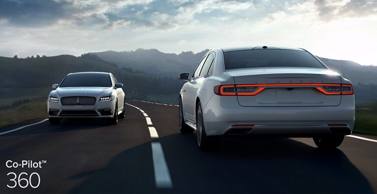 Lincoln vehicles on a road demonstrating the Lane Keeping System which is part of Co Pilot 3 60