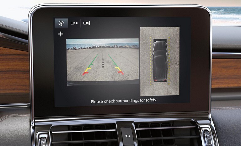A close up of the touchscreen display showing birds eye view of the Lincoln vehicle which is made possible by a 3 60 Degree Camera