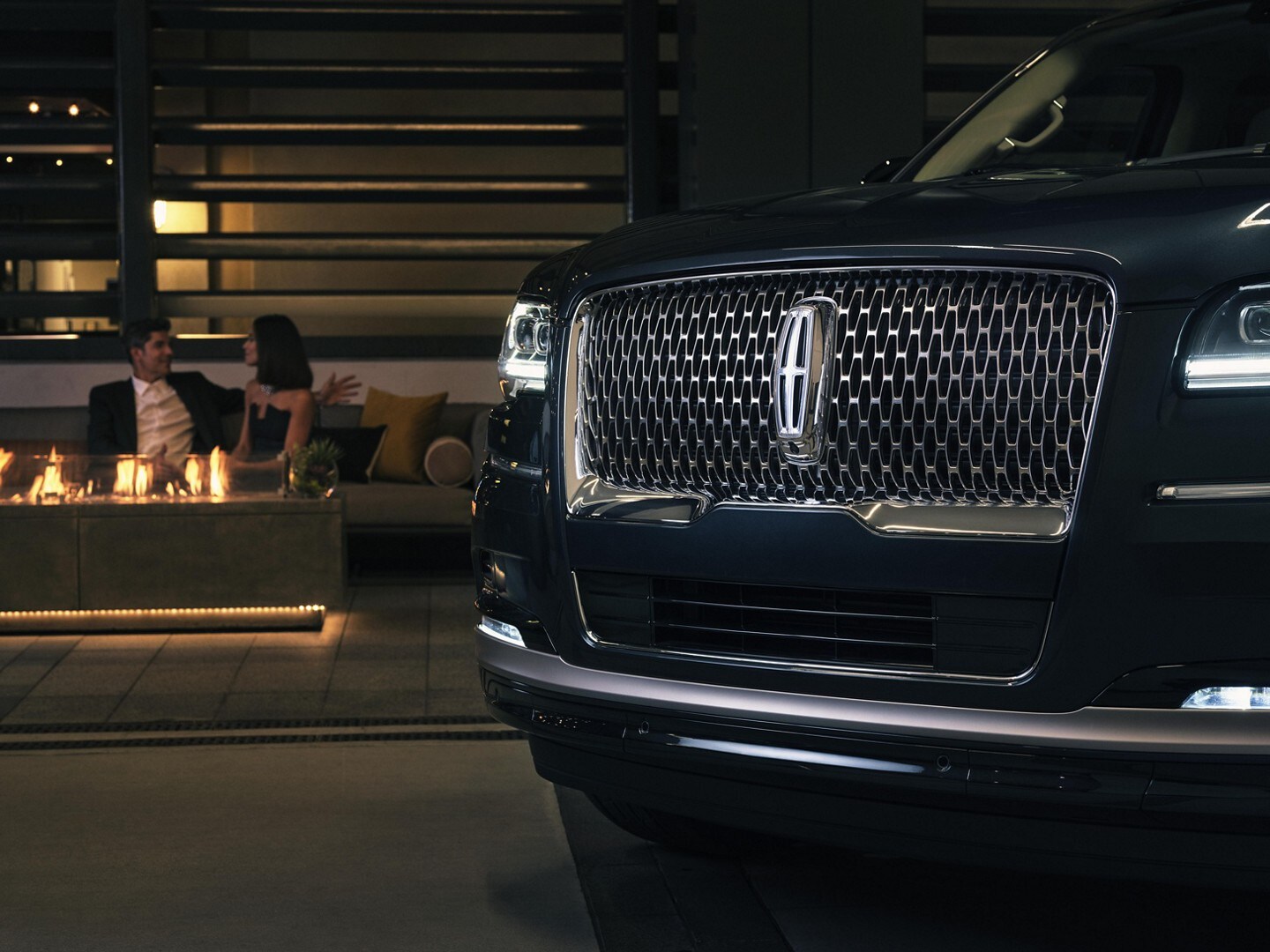 The grille design of a 2023 Lincoln Black Label Navigator® SUV shows off the illuminated Lincoln Star.
