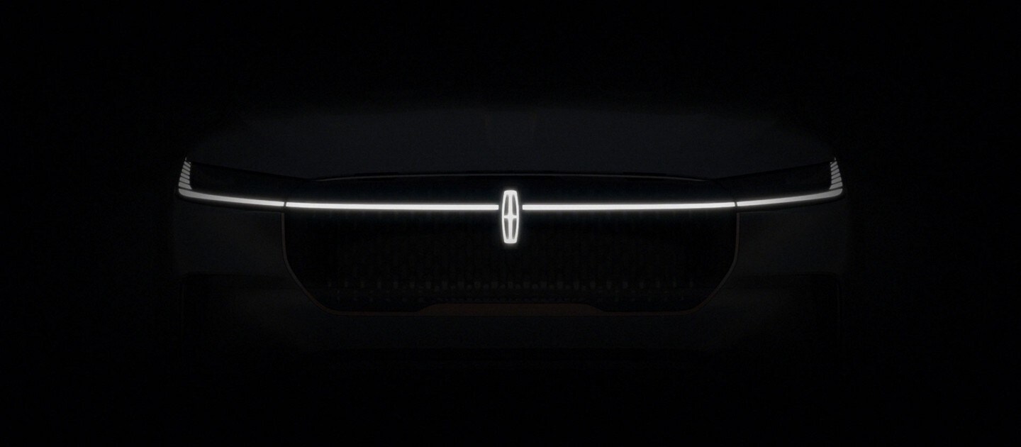 Lincoln electric vehicle emblem glows on black