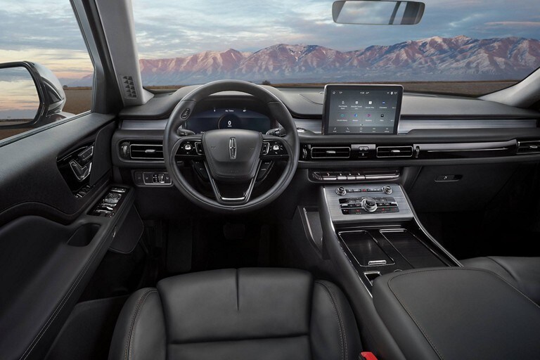 The interior of a 2023 Lincoln Aviator® is shown from the perspective of the driver