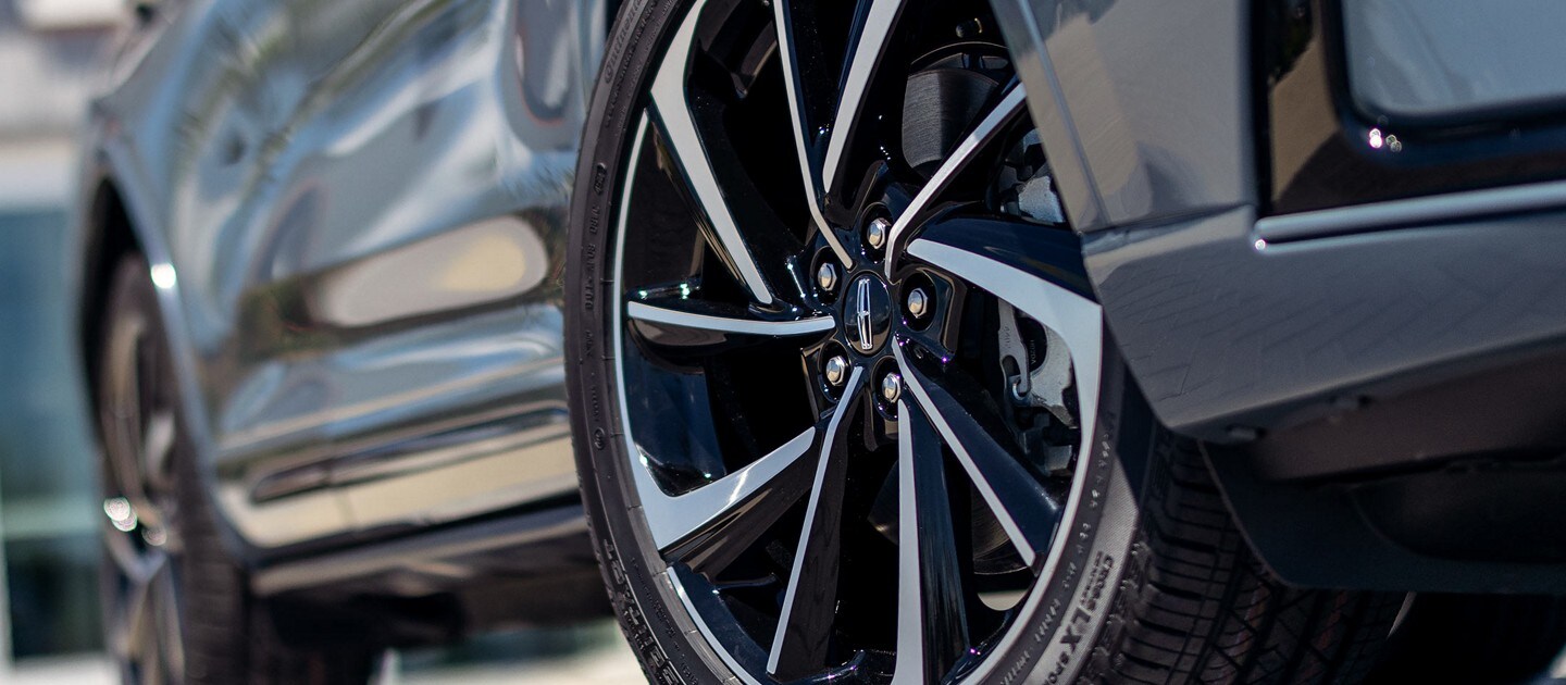 A 2023 Lincoln Corsair SUV is shown with 20-inch premium aluminum wheel