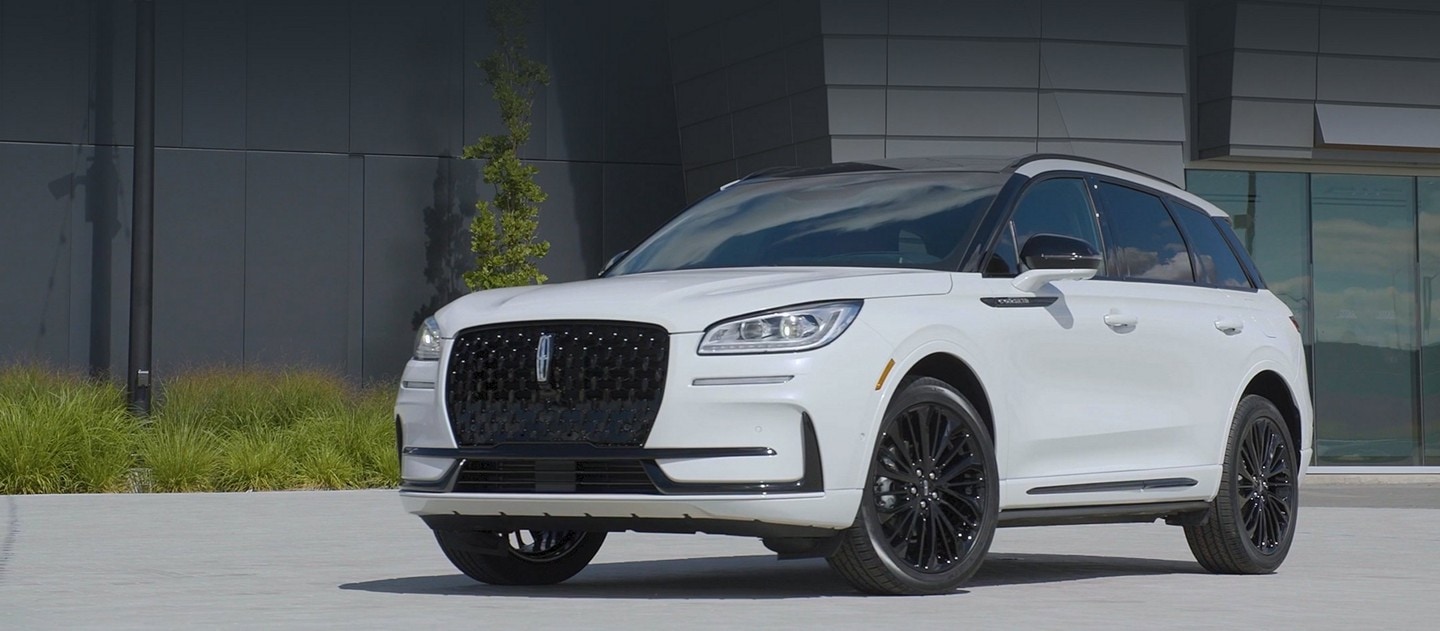 The 2025 Lincoln Corsair parked infront of a building.