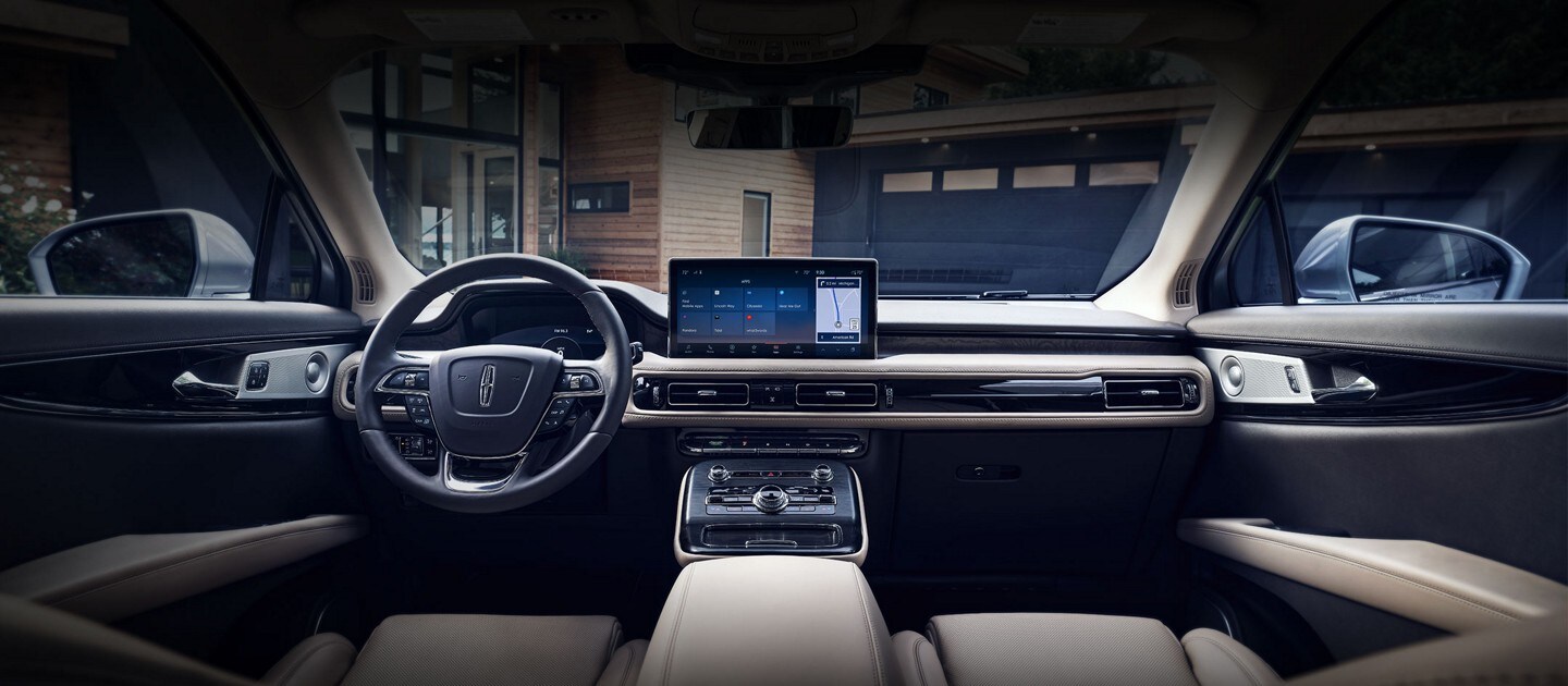 The expansive front cabin of a 2023 Lincoln Nautilus is shown from the second row