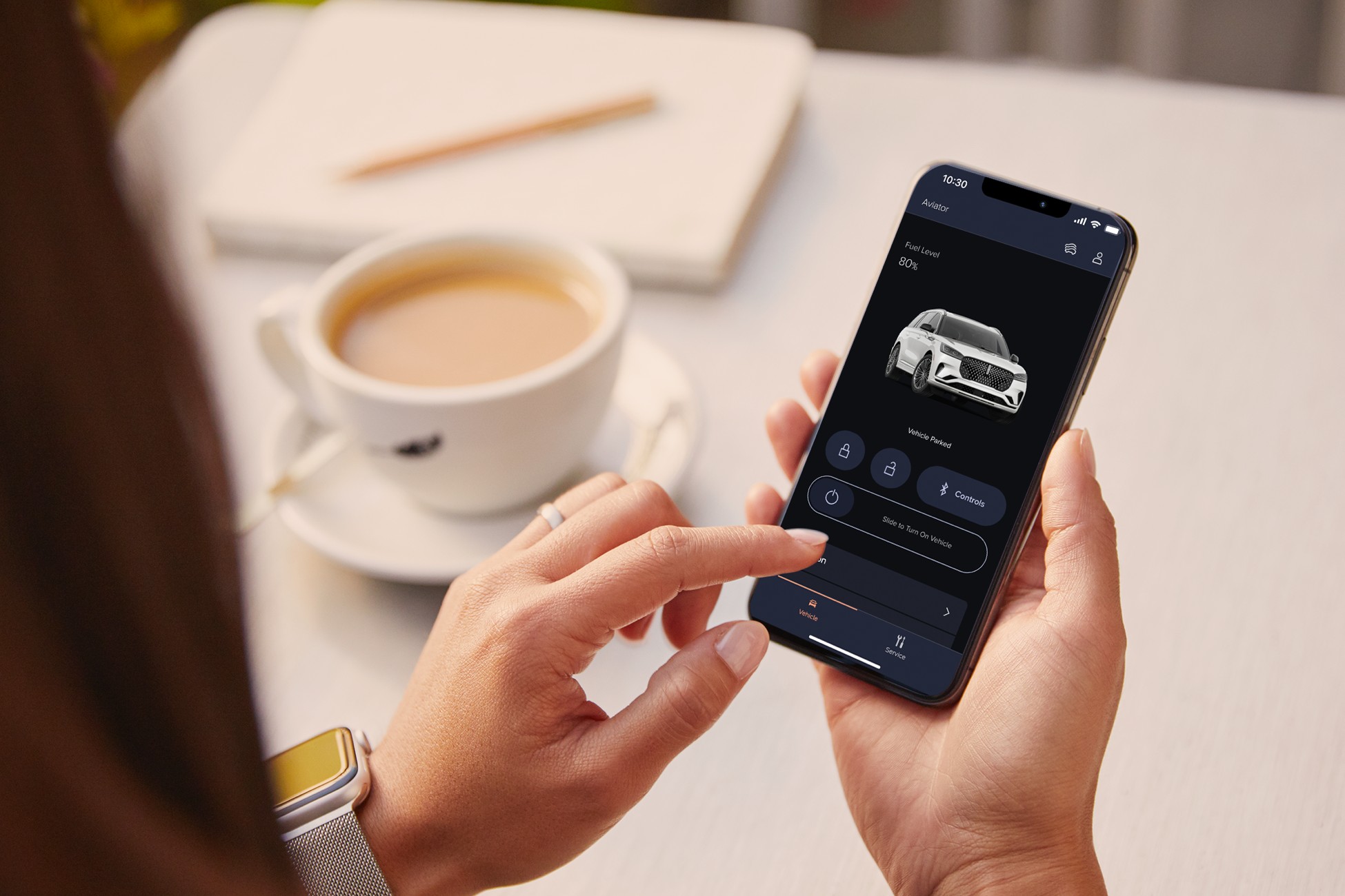 A woman on her phone checking the Lincoln Way App.