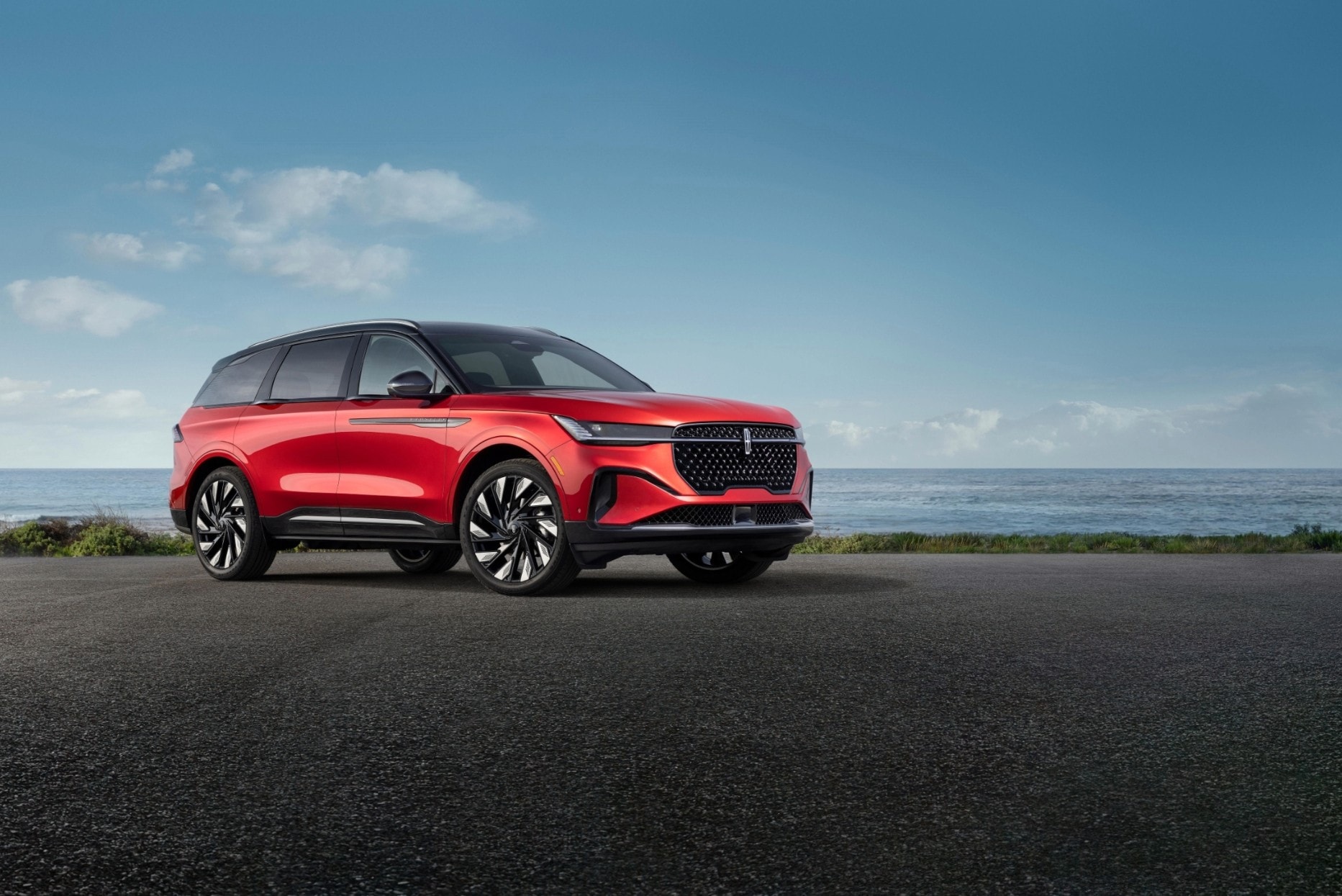 The 2024 Lincoln Nautilus® SUV parked near the ocean.
