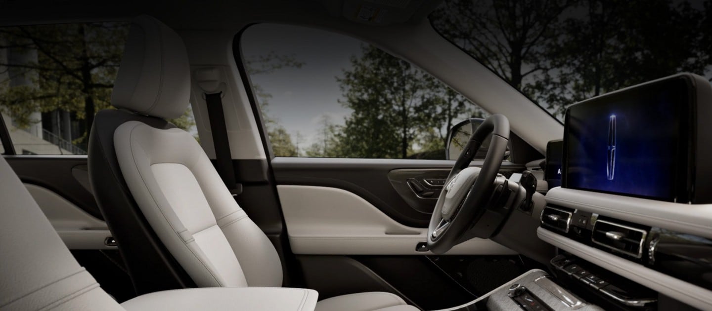 The interior of a 2025 Lincoln Aviator® SUV shows a Lincoln Star logo on the centre touchscreen