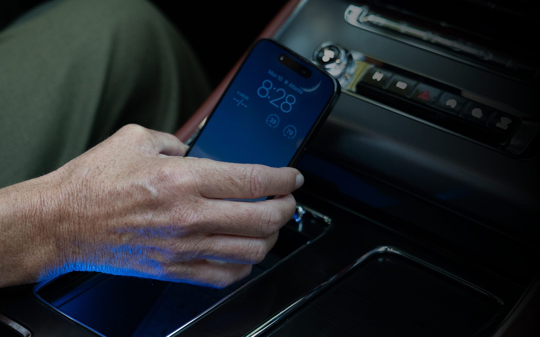 A mobile device is placed on a wireless charging pad