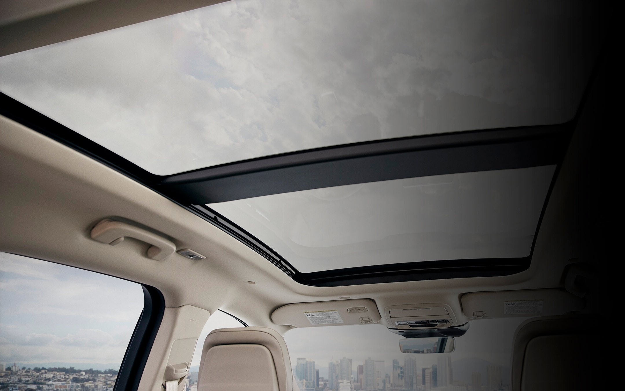 The available panoramic Vista Roof® is seen from inside a 2026 Lincoln Corsair
