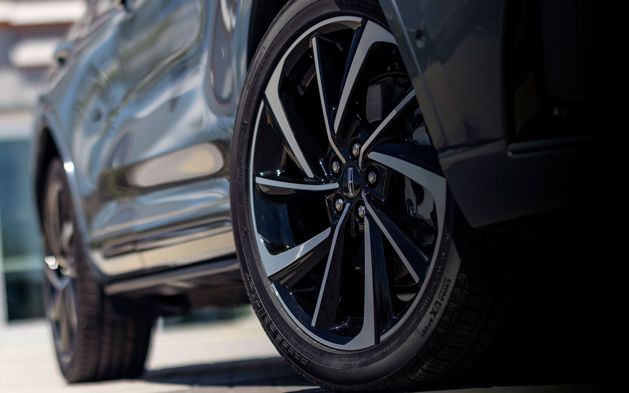The 20" Bright-Machined Aluminum Wheel with Black Premium Paint is shown on a 2026 Lincoln Corsair