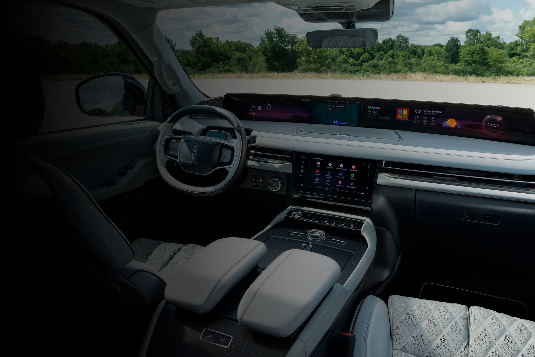 The interior of a 2025 Lincoln Black Label Navigator SUV with the Atmospheric theme