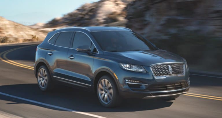 Man and woman in 2020 Lincoln Corsair Interior Side View