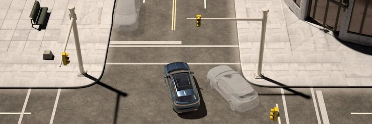 a Lincoln vehicle turning through an intersection is shown here