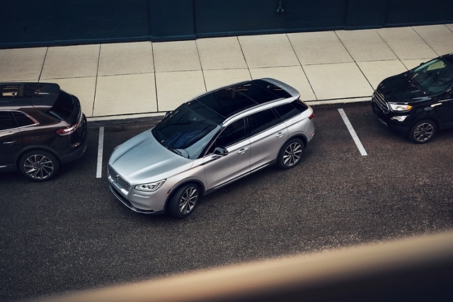 a Lincoln® vehicle parallel parking is shown here 