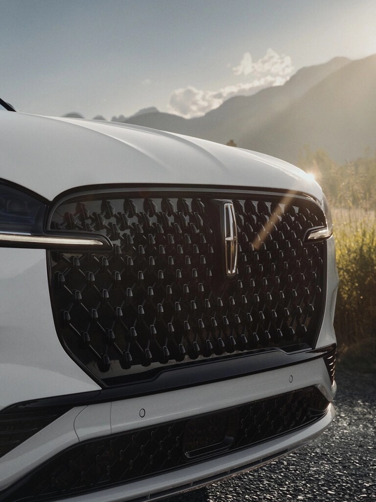 The Auto High Beam Headlamps of a 2026 Lincoln Aviator are illuminated