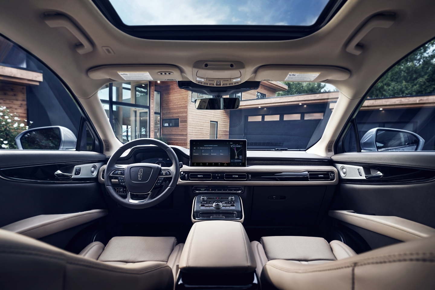 Interior of a 2021 Lincoln Nautilus is shown with clickable hot spots that lead to more details about sync four
