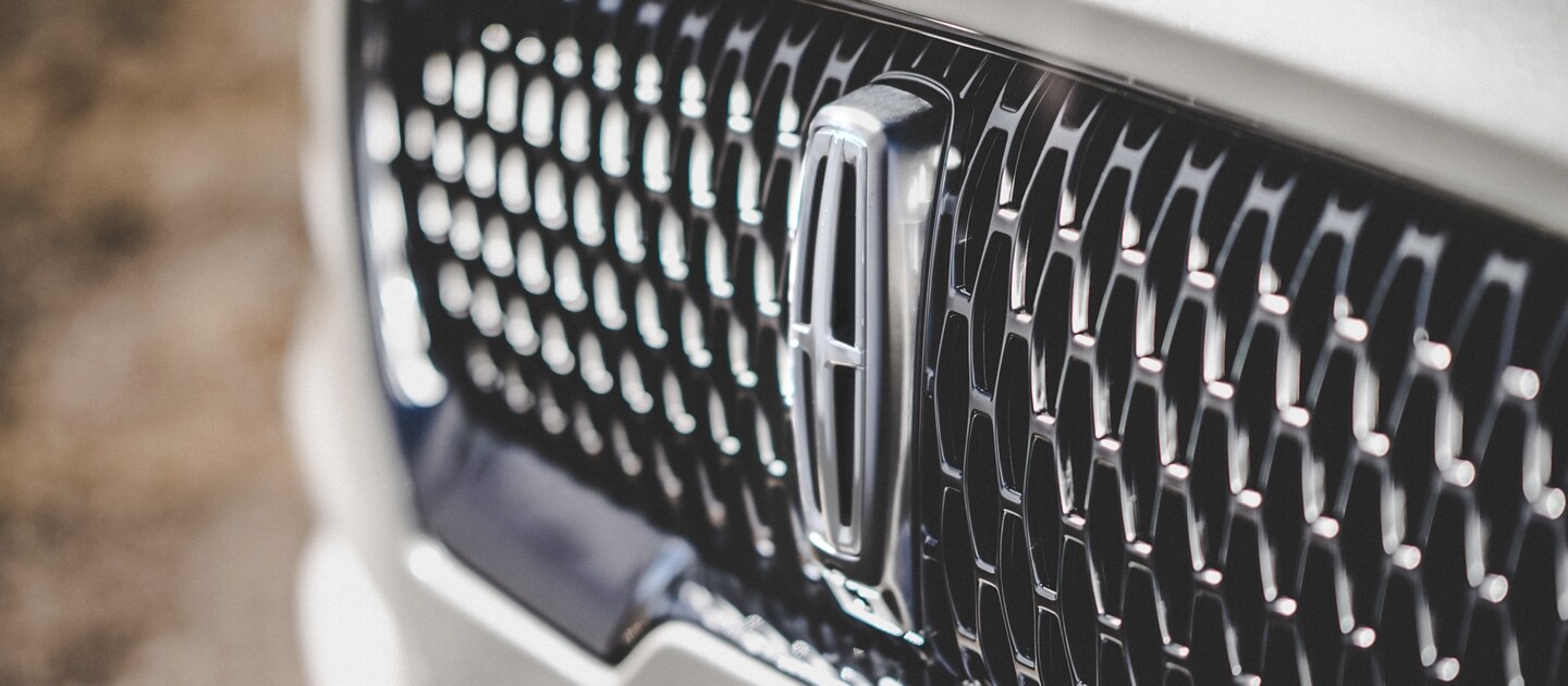 2023 Lincoln Aviator® Reserve grille with repeated field of Lincoln Star emblem shapes