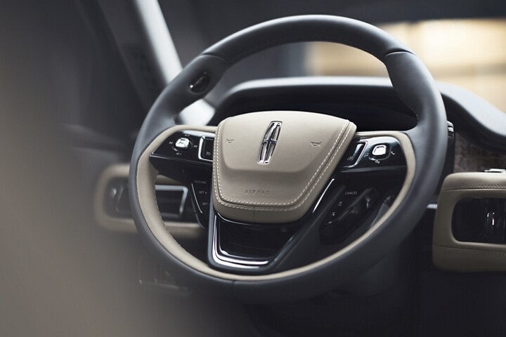 Steering wheel of a 2023 Lincoln Aviator® with intuitively placed controls