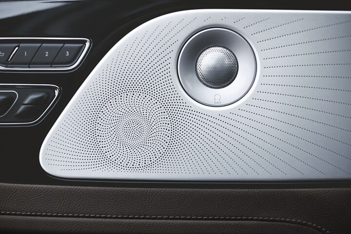 One of the 28 speakers in the Revel® 3D Audio System in a 2023 Lincoln Aviator®