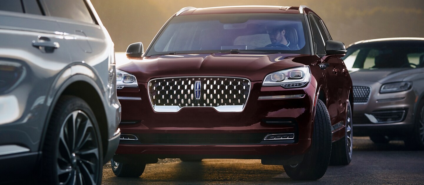 2023 Lincoln Aviator® Grand Touring using the available Active Park Assist 2.0 system to park itself between 2 other vehicles