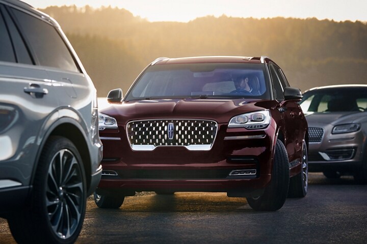 2023 Lincoln Aviator® parking itself between 2 other vehicles