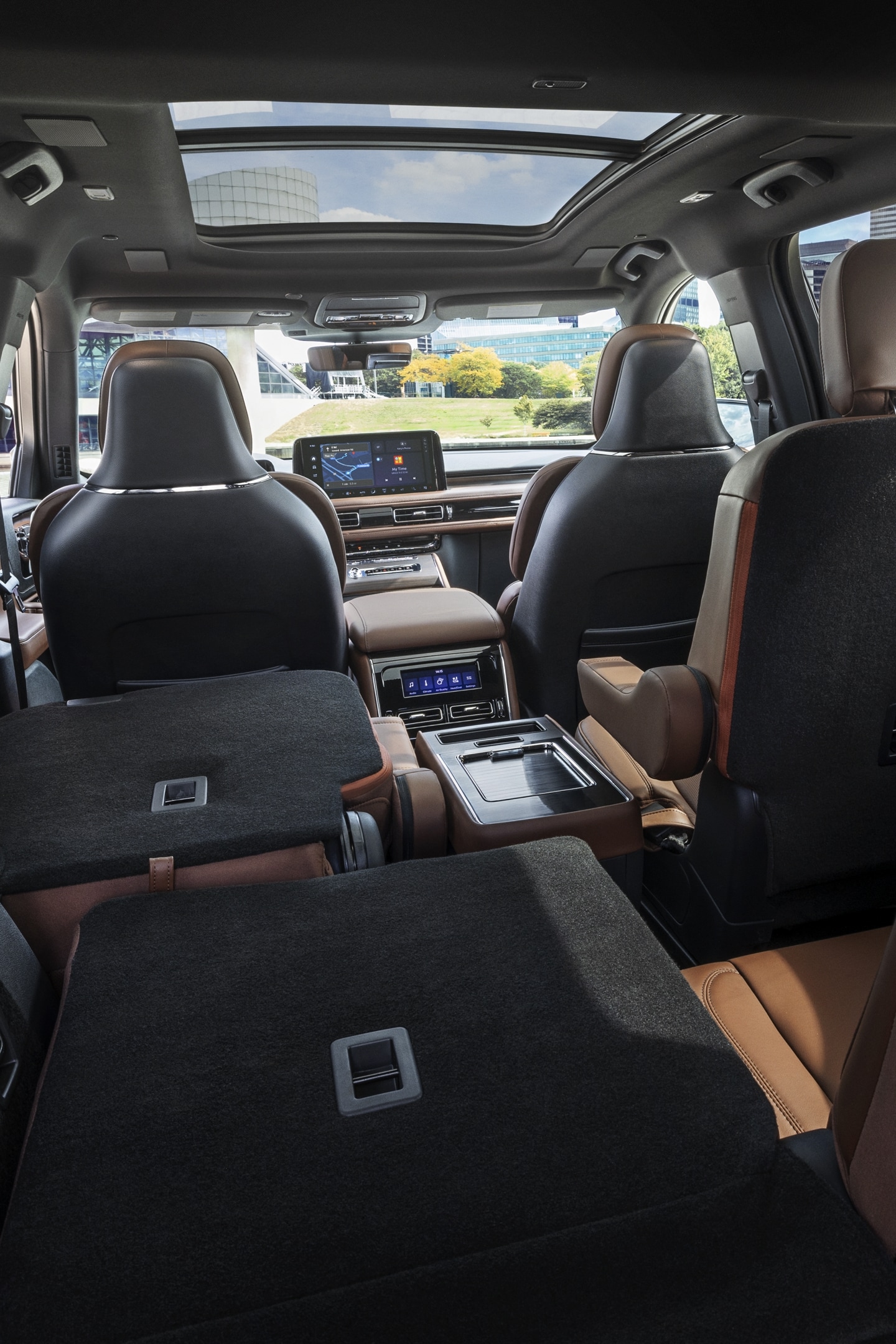 One side of the PowerFold® third-row seat and a second-row seat are folded forward in the 2025 Lincoln Aviator® SUV