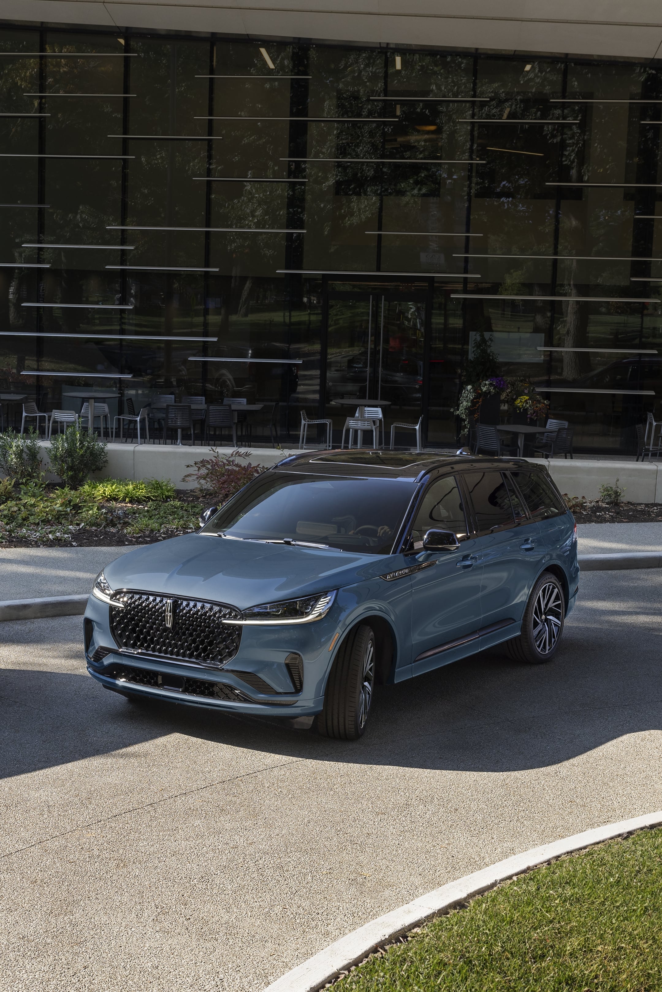 A 2025 Lincoln Aviator is being parallel parked