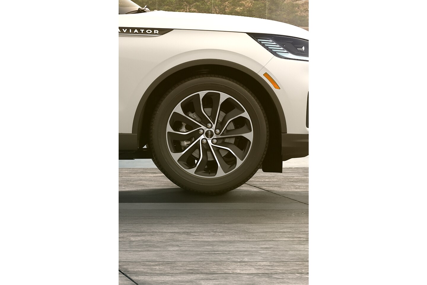 The front right wheel of a 2025 Lincoln Aviator Reserve is shown