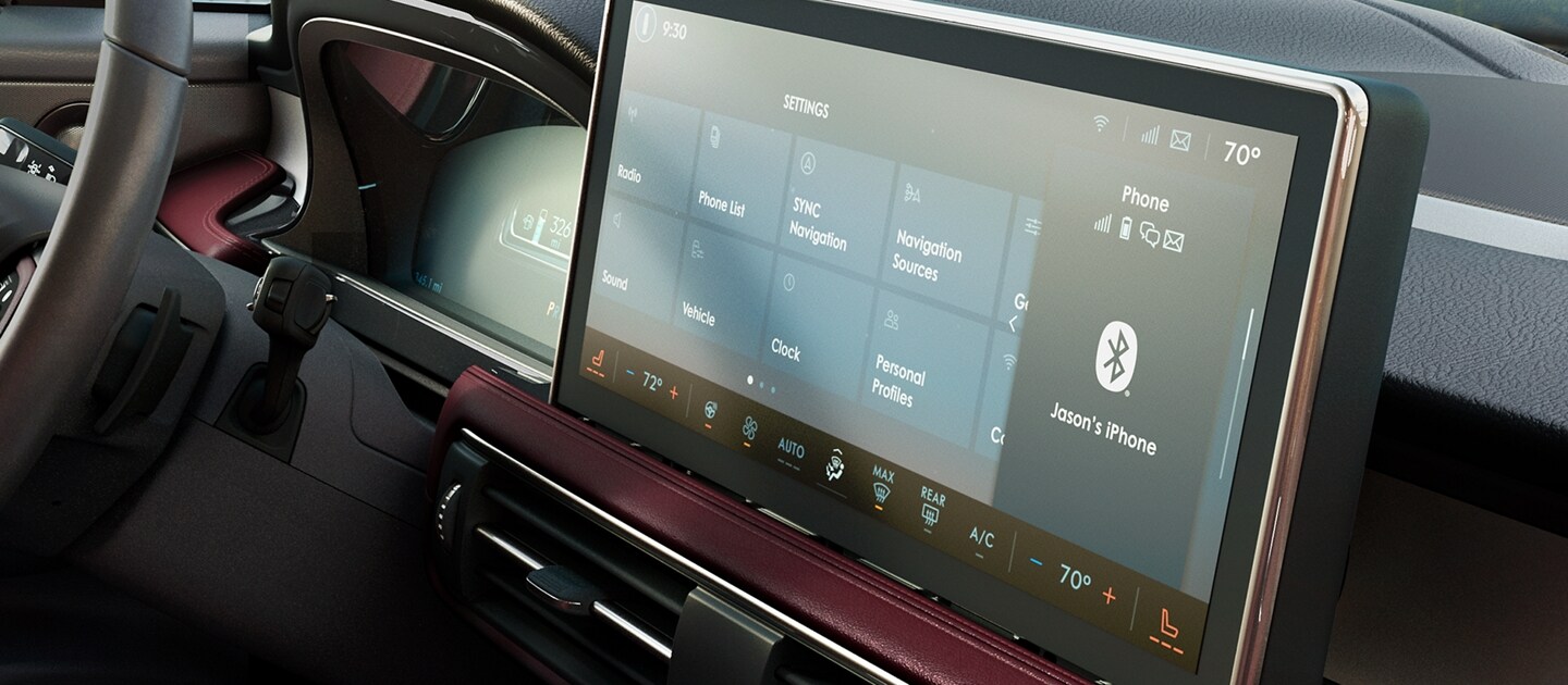 The centre touch screen of a 2023 Lincoln Corsair SUV displays a number of SYNC® 4 setting options