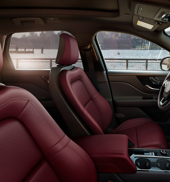 The perfect position front seats in Eternal Red show off comfort and form