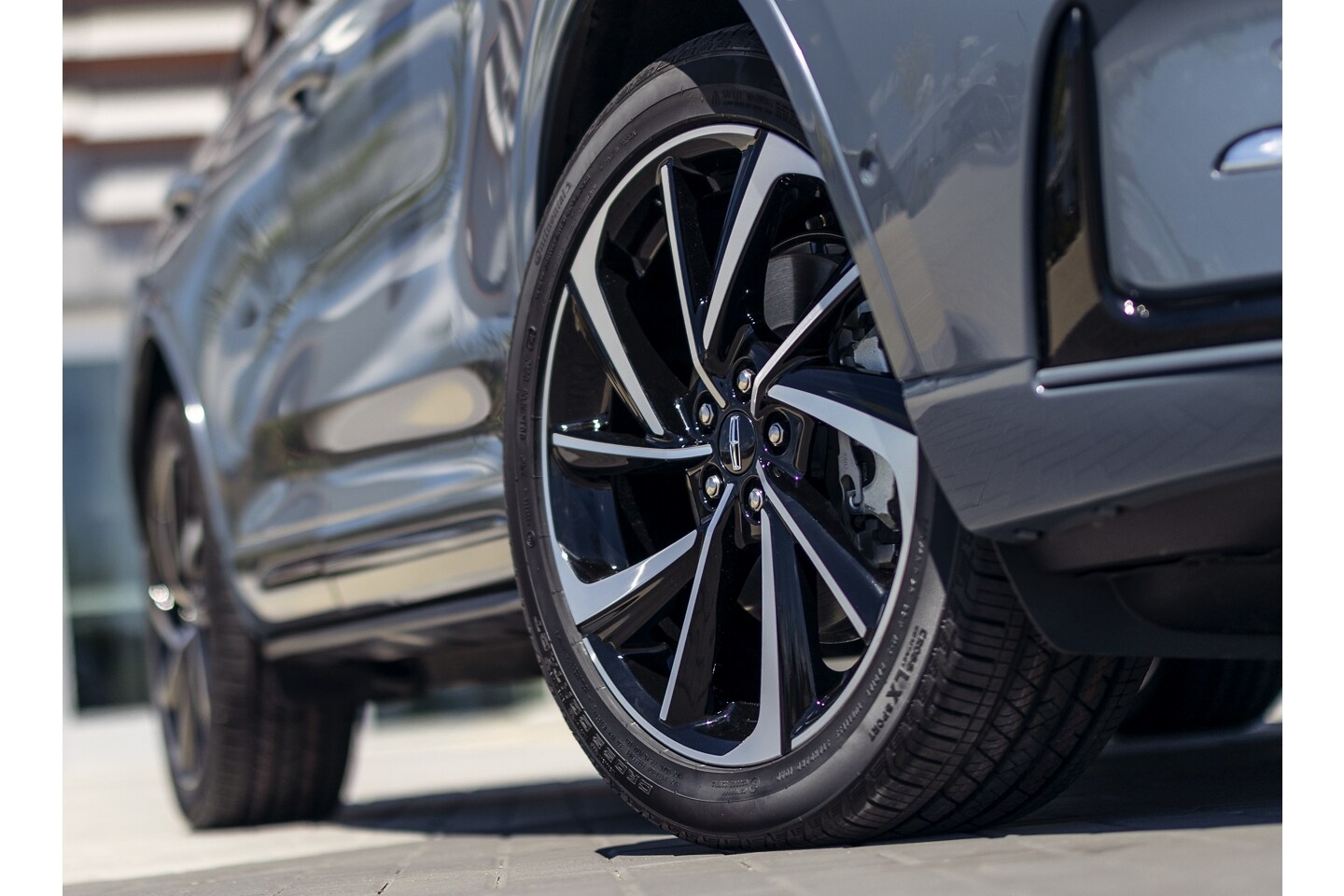 The available 20-inch wheels with Black Premium paint are shown on a 2025 Lincoln Corsair Grand Touring model