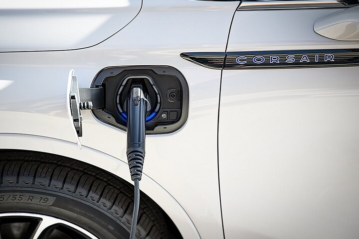 A 2025 Lincoln Corsair Grand Touring model is being charged with a Lincoln Mobile Charging Cord