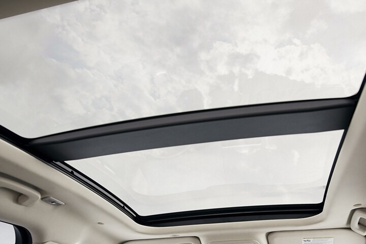 The available panoramic Vista Roof® is seen from inside a 2025 Lincoln Corsair