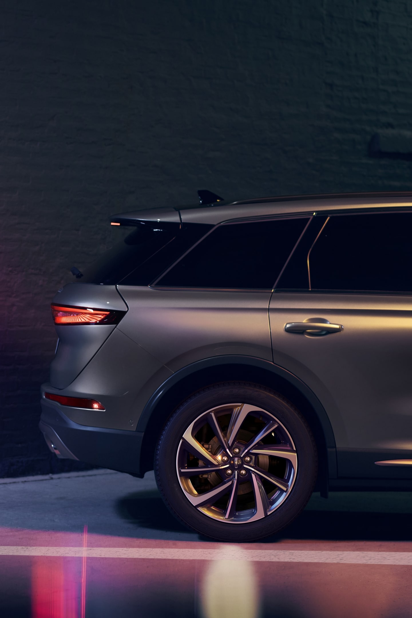 A 2025 Lincoln Corsair uses Reverse Brake Assist as it backs up toward a wall