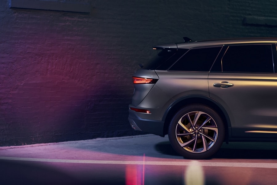 A 2025 Lincoln Corsair uses Reverse Brake Assist as it backs up towards a wall