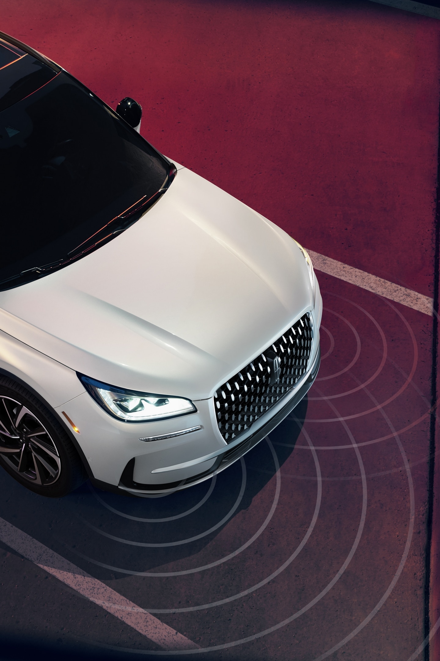 Simulated sensing waves emit from a 2025 Lincoln Corsair Reserve to demonstrate Pre-Collision Assist