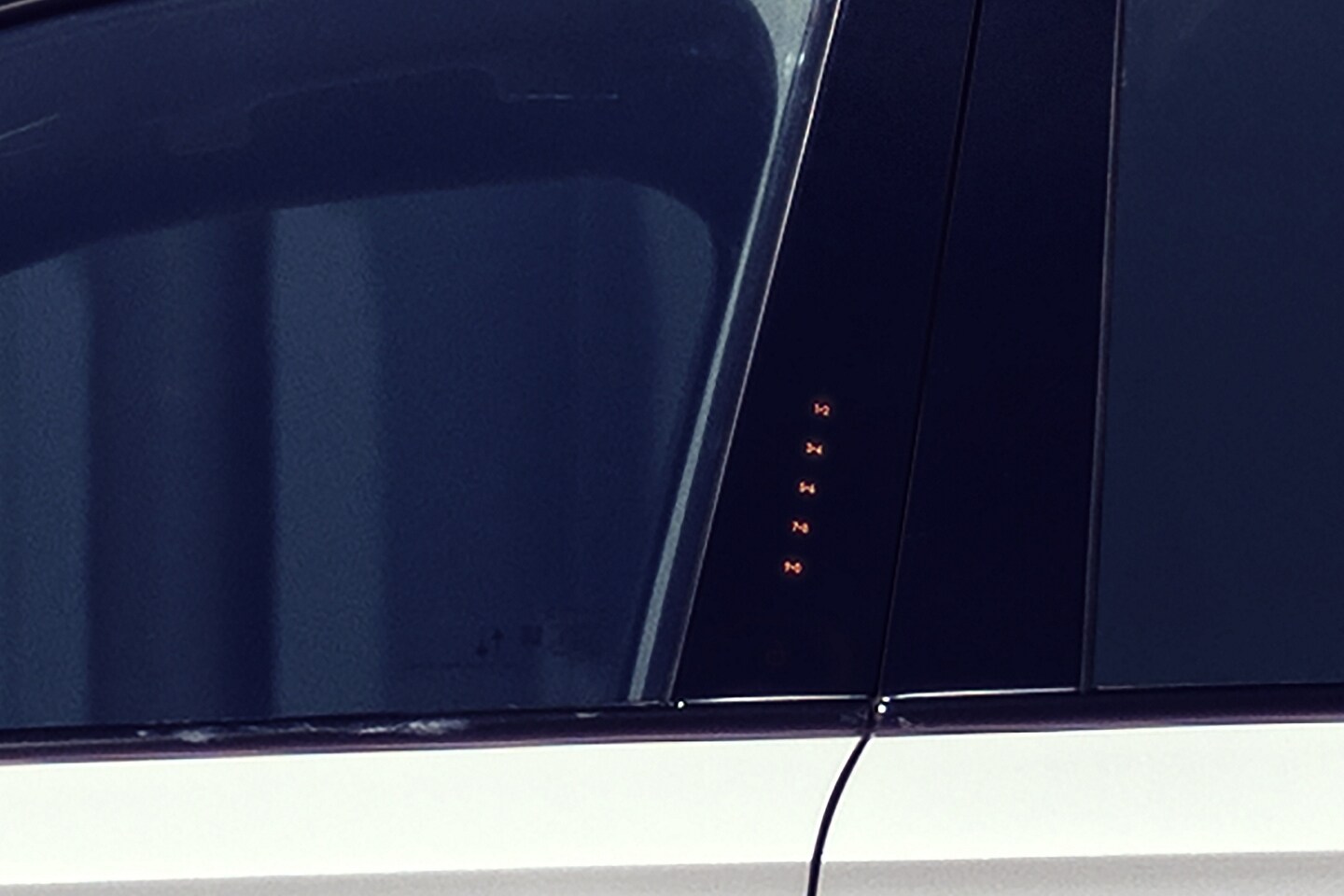 The SecuriCode® Keyless entry pad numbers are illuminated on the outside of the driver's door on a 2025 Lincoln Corsair SUV