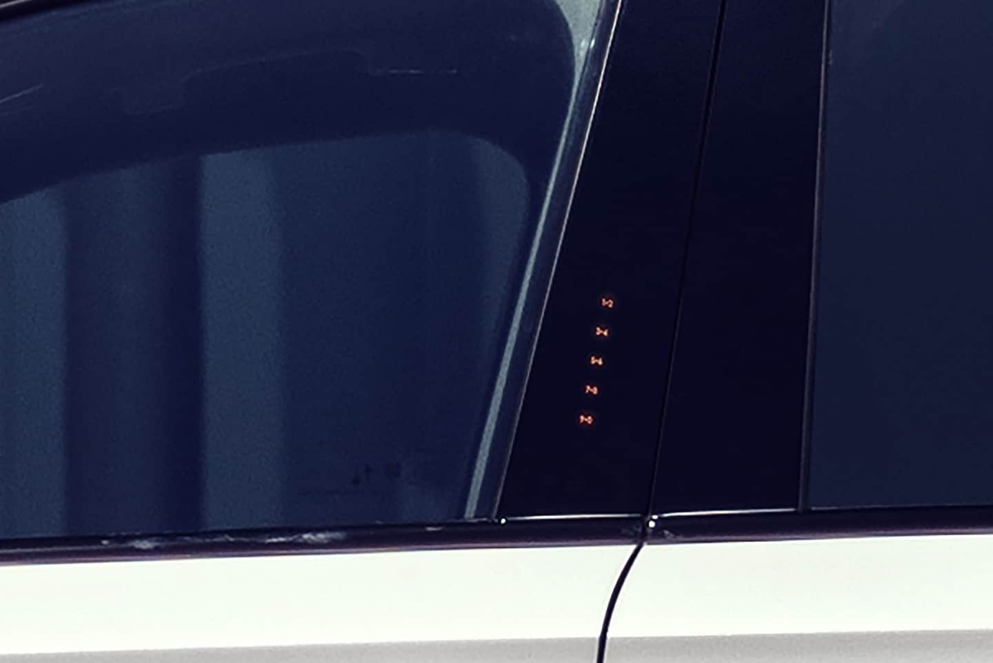 The SecuriCode® Keyless entry pad numbers are illuminated on the outside of the driver's door on a 2025 Lincoln Corsair SUV