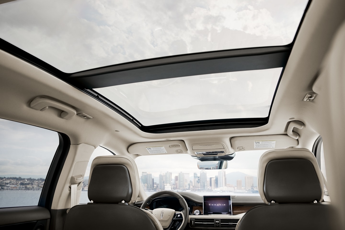The available panoramic Vista Roof® is shown from inside a 2026 Lincoln Corsair SUV
