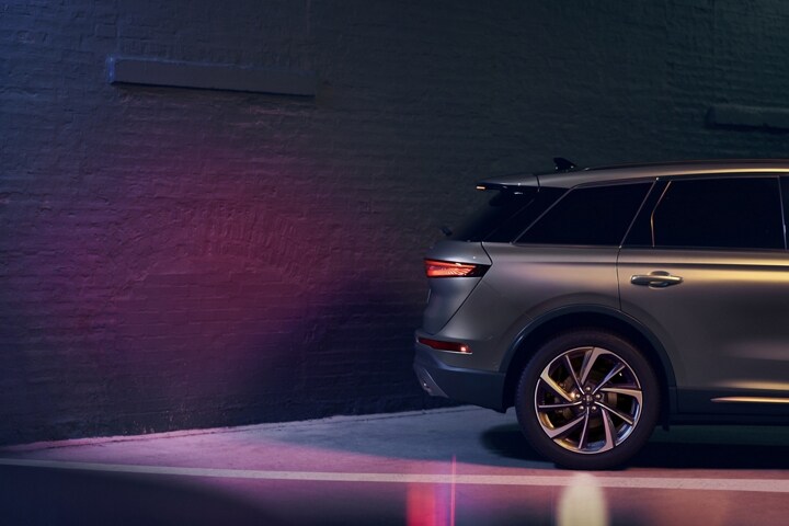 A 2026 Lincoln Corsair uses Reverse Brake Assist as it backs up toward a wall