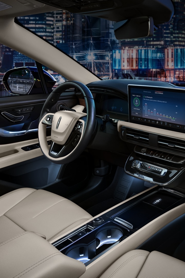 The interior of a 2026 Lincoln Corsair is shown in the Light Smoked Truffle interior colour