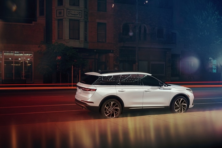 A 2026 Lincoln Corsair is parked in the city at night